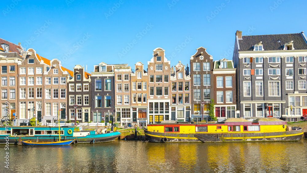 Dutch house style with the canal in Amsterdam city, Netherlands
