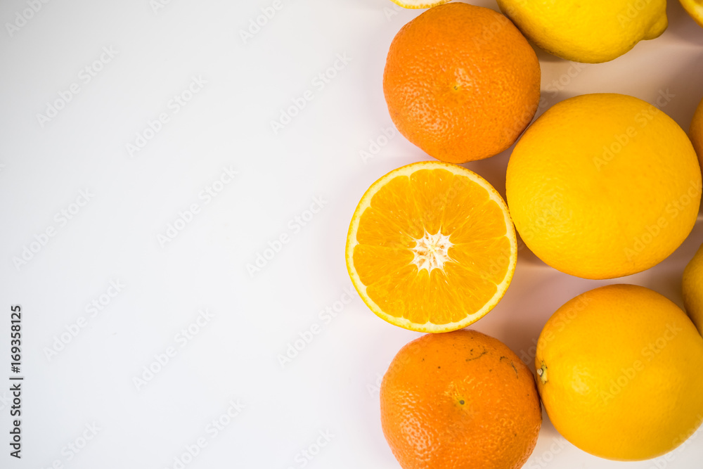 Fototapeta premium orange with half of orange isolated on the white background