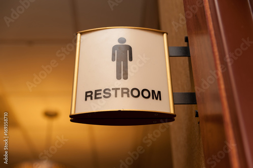 Public men restroom sign close up image