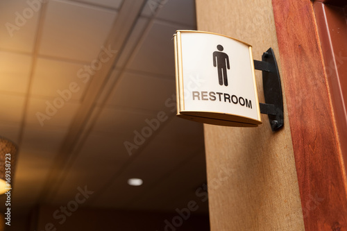 Public men restroom sign close up image