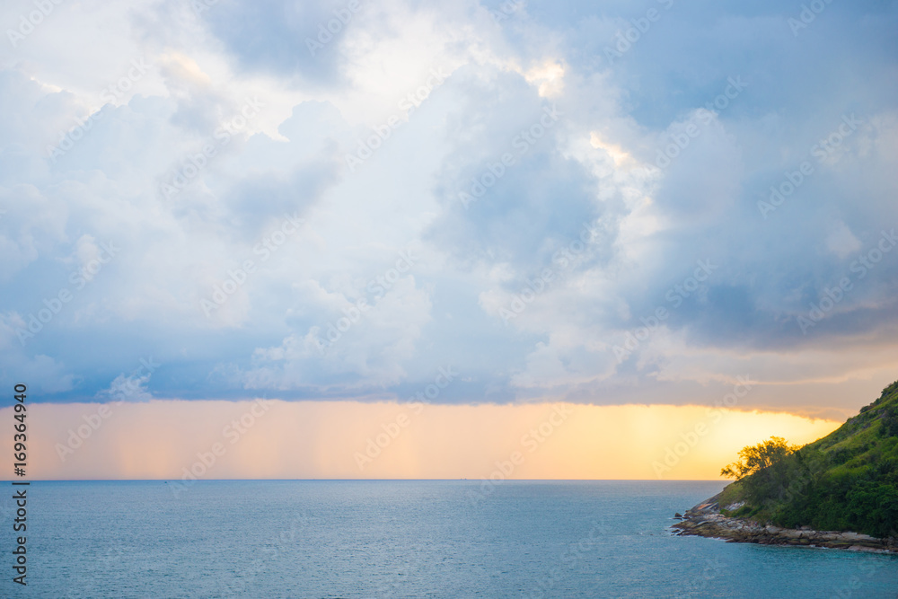 Fototapeta premium Big clouds on the sky at sunset time