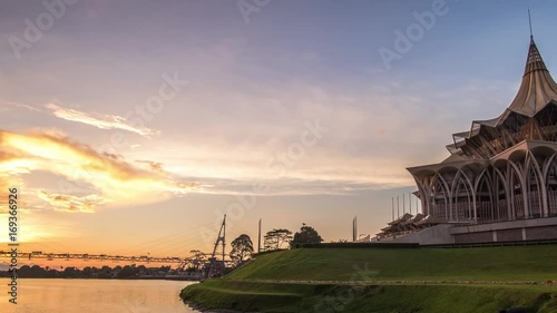 SARAWAK - JULY 3: A 4K footage of beautiful panning to the right and zooming out sunset with the background view of Sarawak State Legislative Assembly on July 3, 2017 in Sarawak.