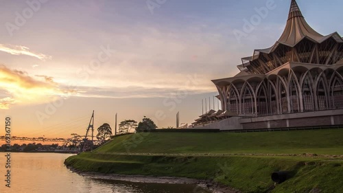 SARAWAK - JULY 3: A 4K footage of beautiful zooming out sunset with the background view of Sarawak State Legislative Assembly on July 3, 2017 in Sarawak.