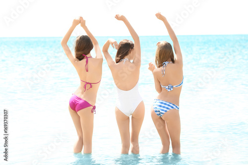 Beautiful young women at se...