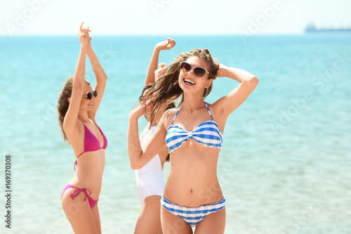 Beautiful young women at se...