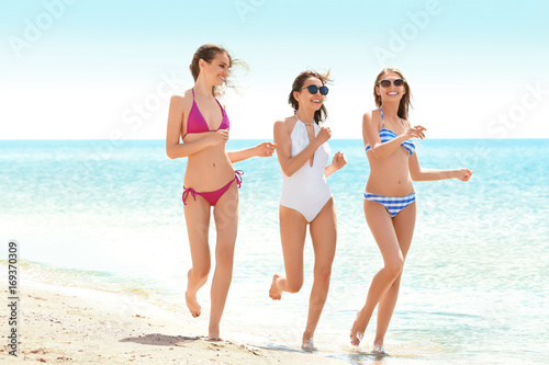 Beautiful young women at se...