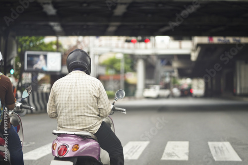 Canvas Print Motorcycle stop on the Road. Traffic jam in Bangkok, Thailand.