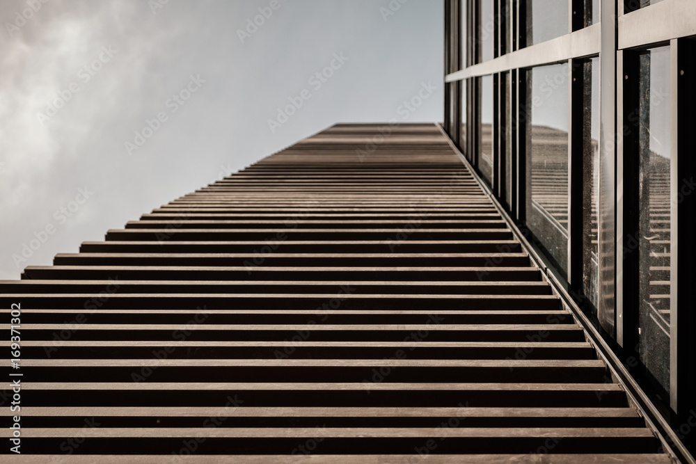 Fototapeta premium Look upwards at corners on buildings create interesting angles and lines