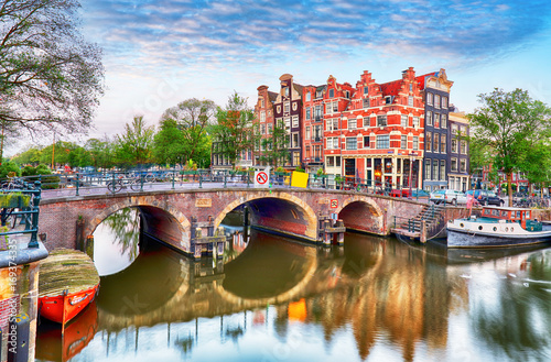 Fototapeta Naklejka Na Ścianę i Meble -  Bridges over canals in Amsterdam, Netherlands