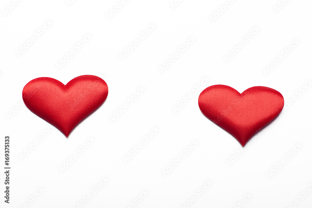 Two red hearts on white background. Isolated.