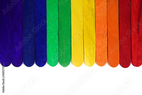 Natural Wooden Rainbow colored. Painted Wooden Multicolored.Rainbow wooden Background.