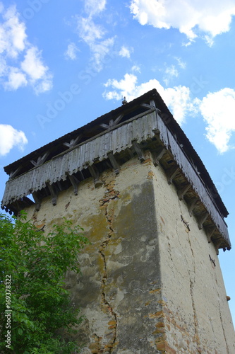 Ruins. Fortified medieval saxon evangelic church in the village Cobor, Transylvania, Romania. The settlement was founded by the Saxon colonists in the middle of the 12th century photo