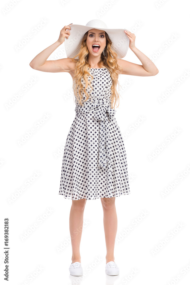 Excited And Happy Young Woman In Summer Dress And White Sun Hat Excited And Happy Young Woman In Summer Dress And White Sun Hat