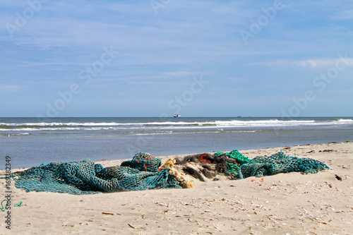 Fishing nets washed up on the beach