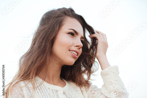 Close up portrait of young beautiful woman with long hair
