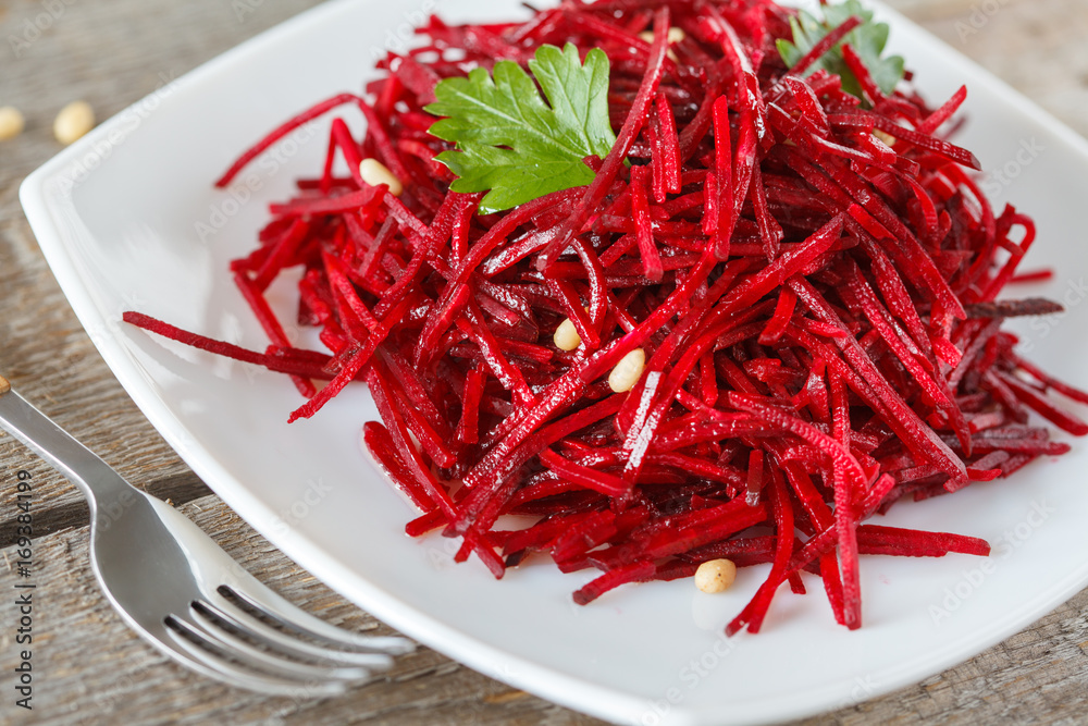 healthy beetroot salad with oil and nuts. healthy beetroot salad with oil and nuts.