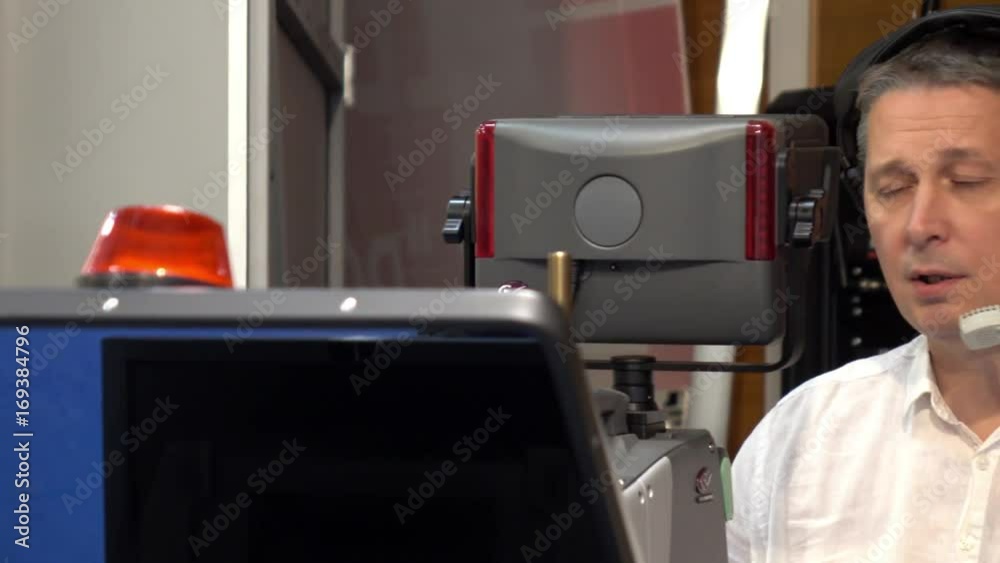 Operator on TV. the operator works with a cinema TV broadcast camera Operator on TV. the operator works with a cinema TV broadcast camera