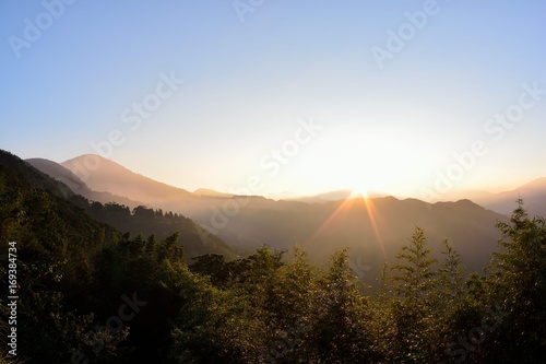 Beautiful sunrise with shining sun on a skyline in the Jianshi Township,Hsinchu,Taiwan.