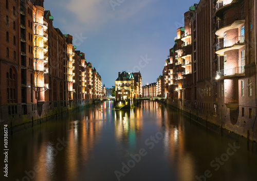 old warehouse district Speicherstadt in Hamburg, Germany illuminated at night