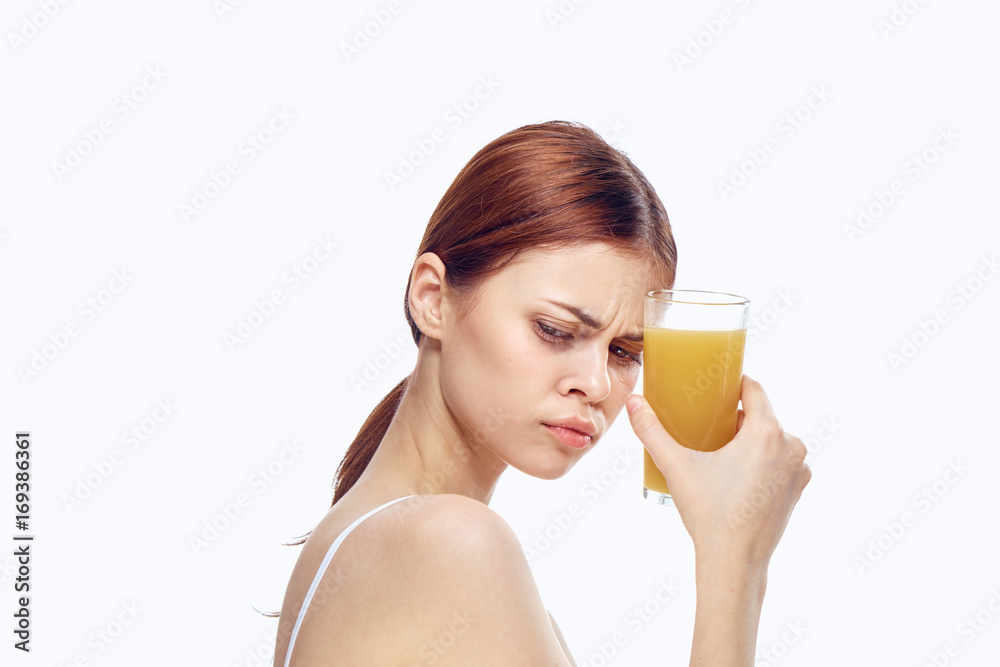 Woman holding a glass of juice