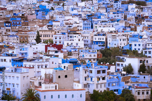 Detail of the buildings in the beautiful town of Chefchaouen in Morocco, North Africa  Concept for travel in Morocco © Tiago Fernandez