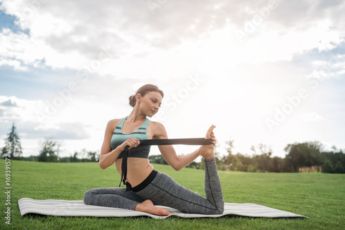 woman sitting in yoga position