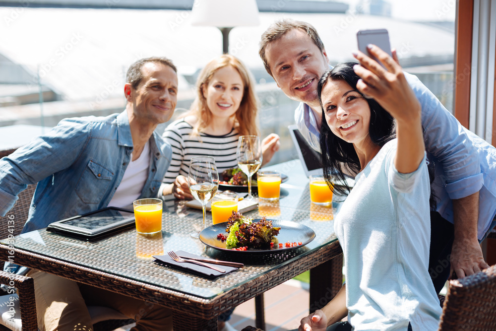 Happy positive friends taking selfie Happy positive friends taking selfie