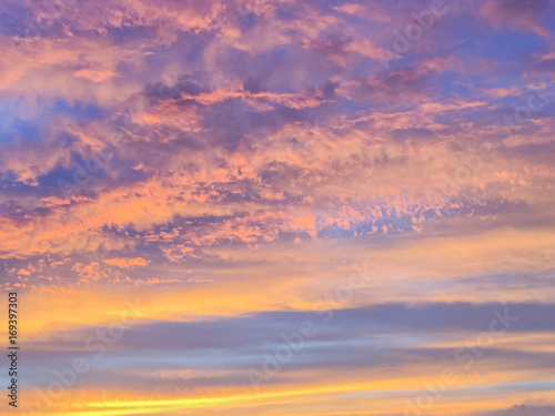 Beautiful sun rays of  sunset  with colorful of  sky background © Umarin