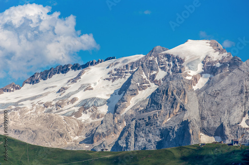 Marmolada named as the Queen of the Dolomites is a mountainous mountain group of the Alps, the highest in the Dolomites, reaching the highest point with Punta Penia (3,343 m). italy photo