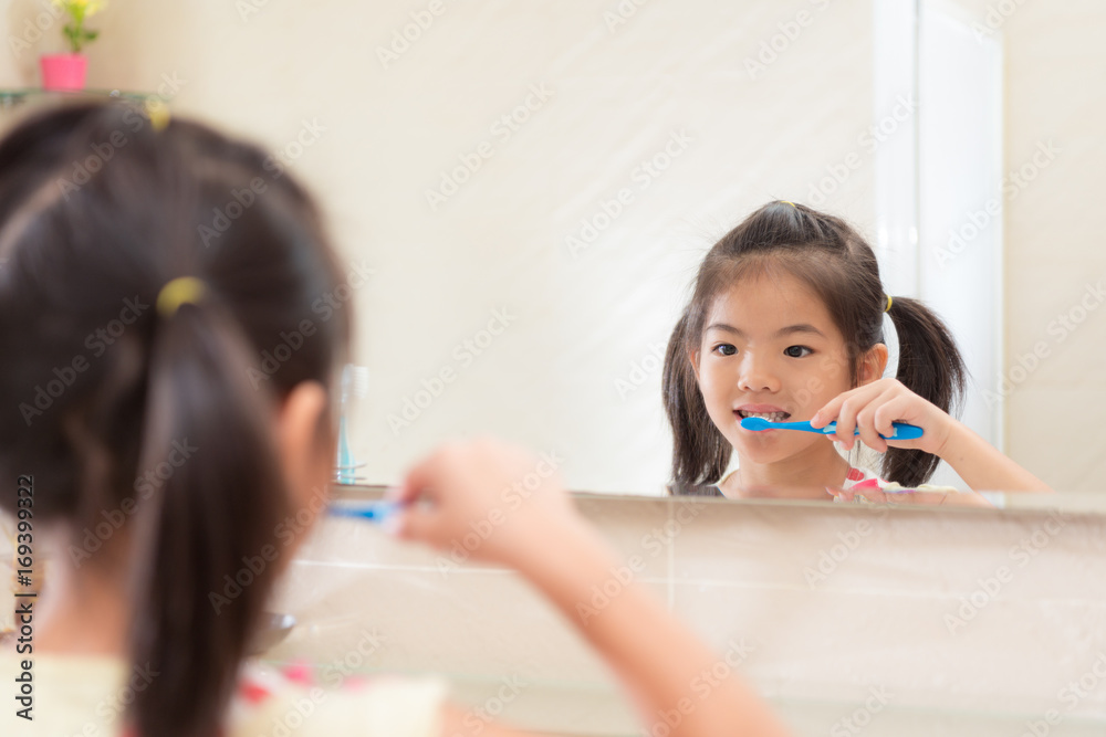 lovely pretty little kid girl looking at mirror lovely pretty little kid girl looking at mirror