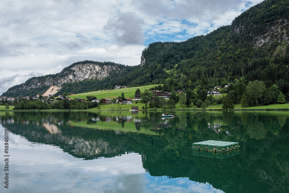 The mountain lake Thiersee in Tyrol, Austria The mountain lake Thiersee in Tyrol, Austria