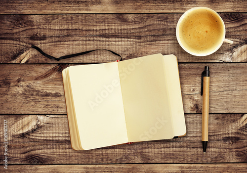 Top view on wooden desk wit...
