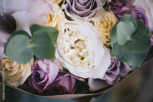 Beautiful fresh flower bouquet with eucalyptus roses and english roses  close up view