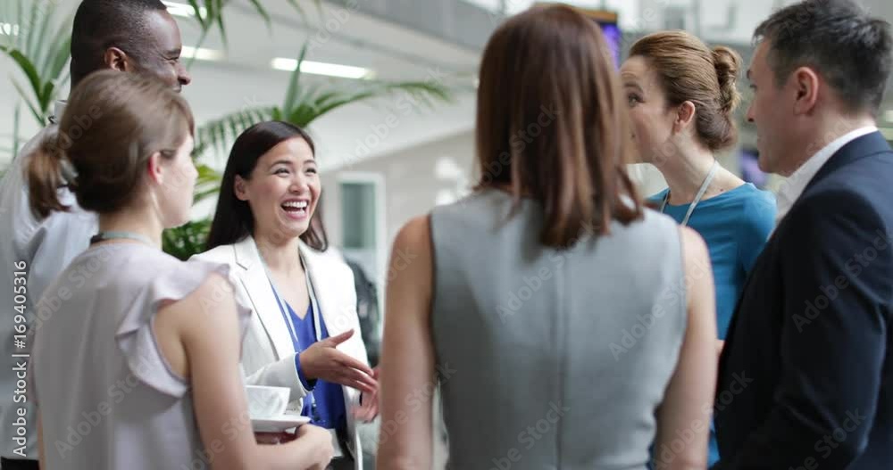 Business executives shaking hands at a networking event