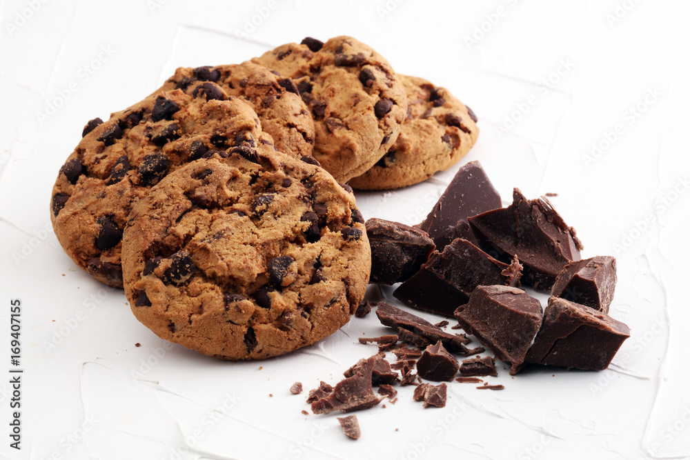 Fototapeta premium Chocolate cookies on white background. Chocolate chip cookies shot