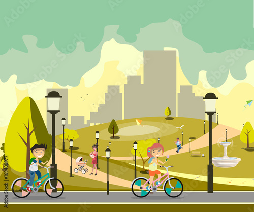 Happy little kids in bikes in park