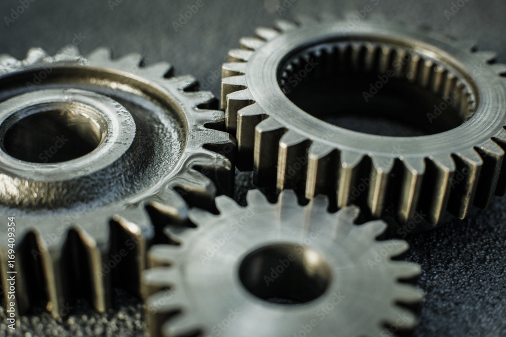 Gears auto set on the rude surface close up Gears auto set on the rude surface close up