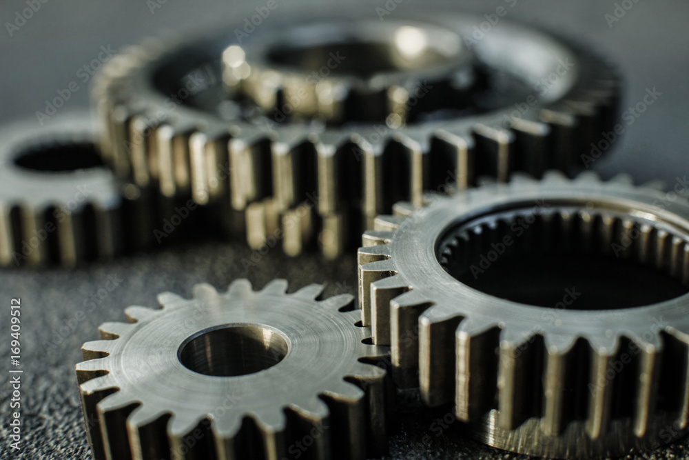 Gears auto set on the rude surface close up Gears auto set on the rude surface close up
