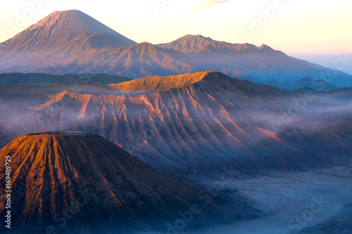 Mount Bromo volcano during sunrise, the magnificent view of Mt.Bromo located in Bromo Tengger Semeru National Park, East Java, Indonesia, Kingkong Hill viewpoint, Penajakan 