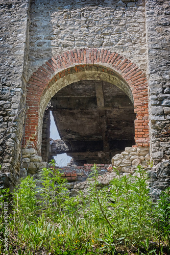 Fototapeta Naklejka Na Ścianę i Meble -  Ruins of an old ruined  house.