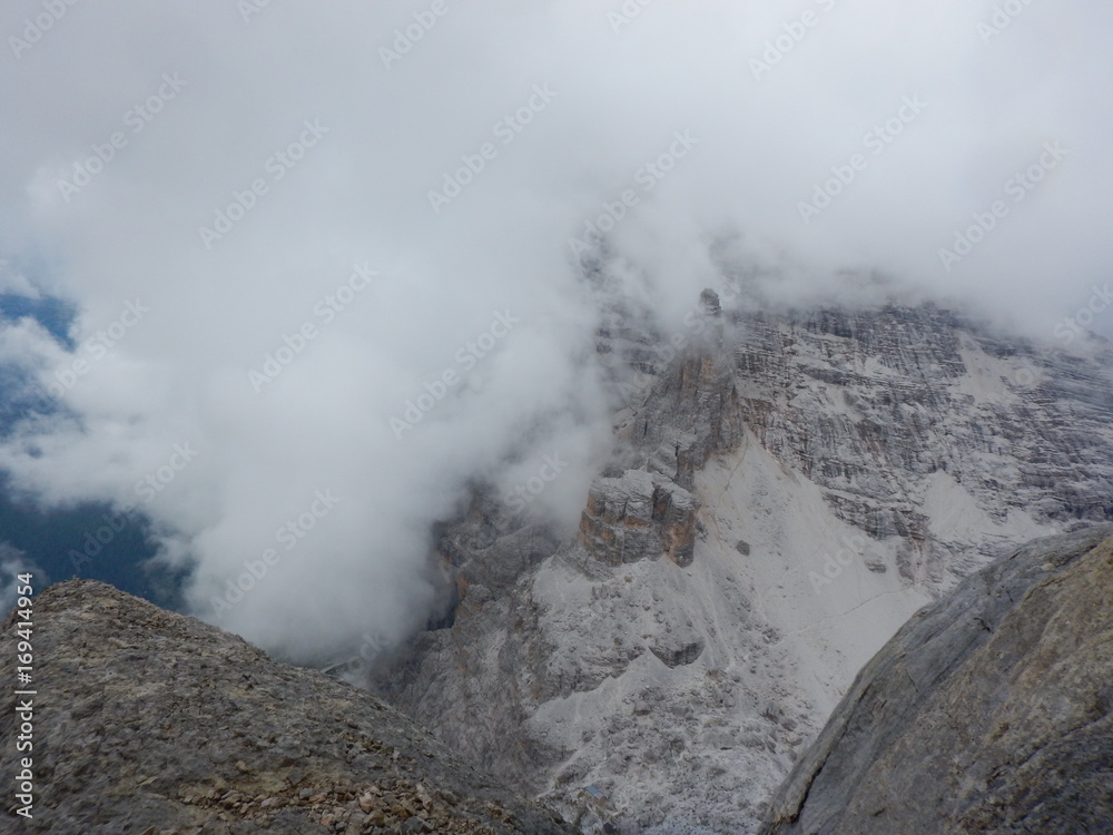 mountaineering on Tofana ridge in dolomites