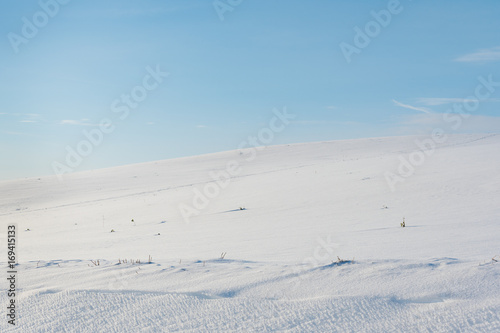 White land in sunny winter day. © Janis Smits