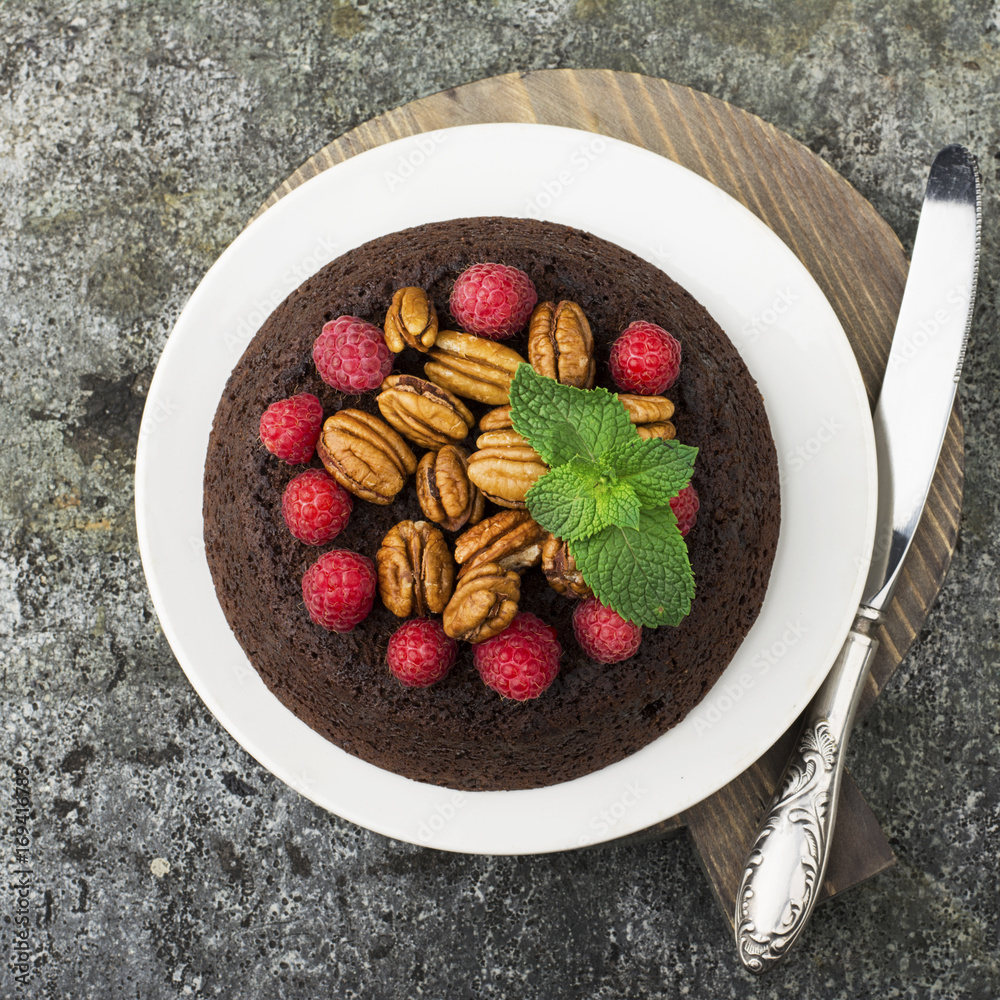 chocolate nut brownie cake decorated with raspberry chocolate nut brownie cake decorated with raspberry