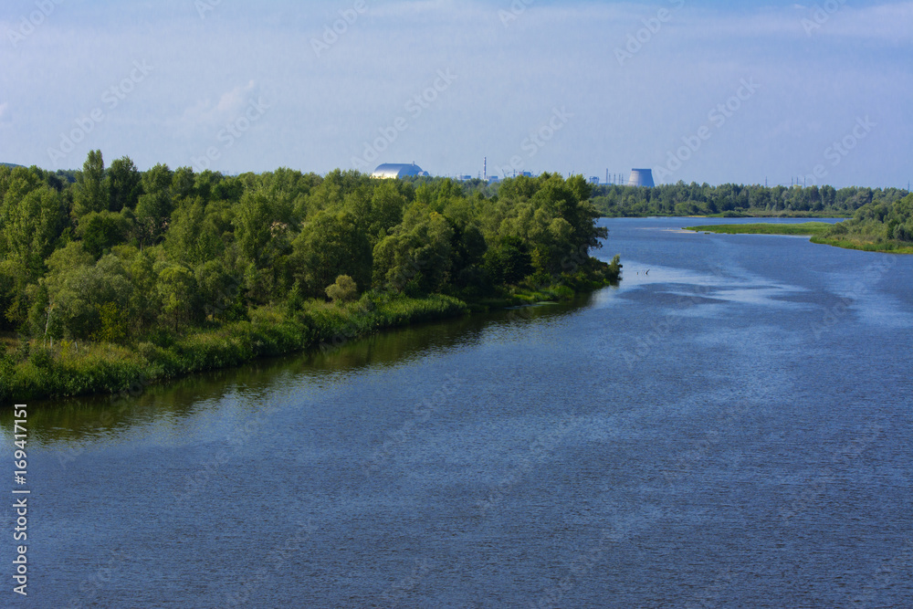 A beautiful river landscape and trees in a dead radioactive zone. Consequences of the Chernobyl nuclear disaster, August 2017. A beautiful river landscape and trees in a dead radioactive zone. Consequences of the Chernobyl nuclear disaster, August 2017.