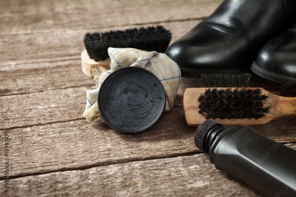 Polish cream,brush,cloth and black boots