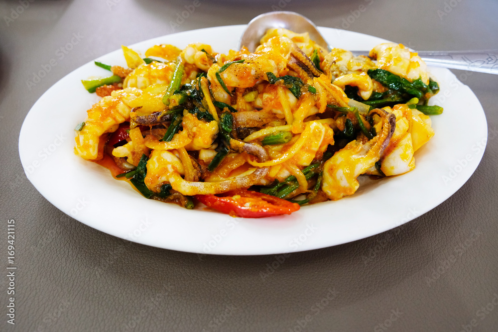 Thai food; Stir Fried squid with salted egg yolk Thai food; Stir Fried squid with salted egg yolk