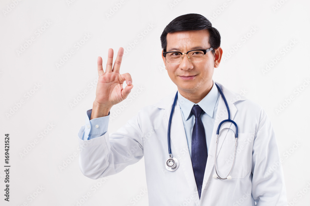 asian doctor showing ok hand gesture, yes, good, approval, acceptance concept asian doctor showing ok hand gesture, yes, good, approval, acceptance concept
