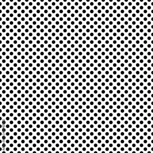 Dotted dense monochrome vector seamless pattern. Polka tile background in black and white.