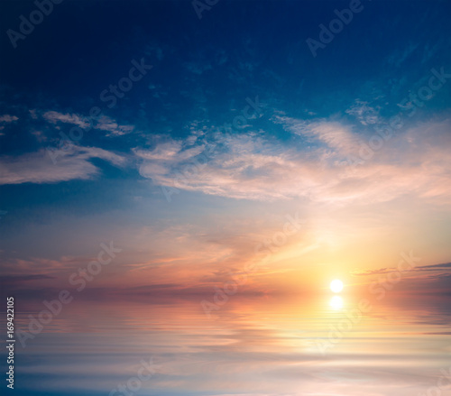 Calm dawn at sea and sun. © Sviatoslav Khomiakov
