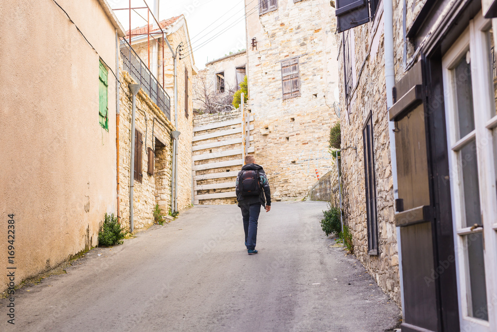 happy young man traveling with backpack happy young man traveling with backpack